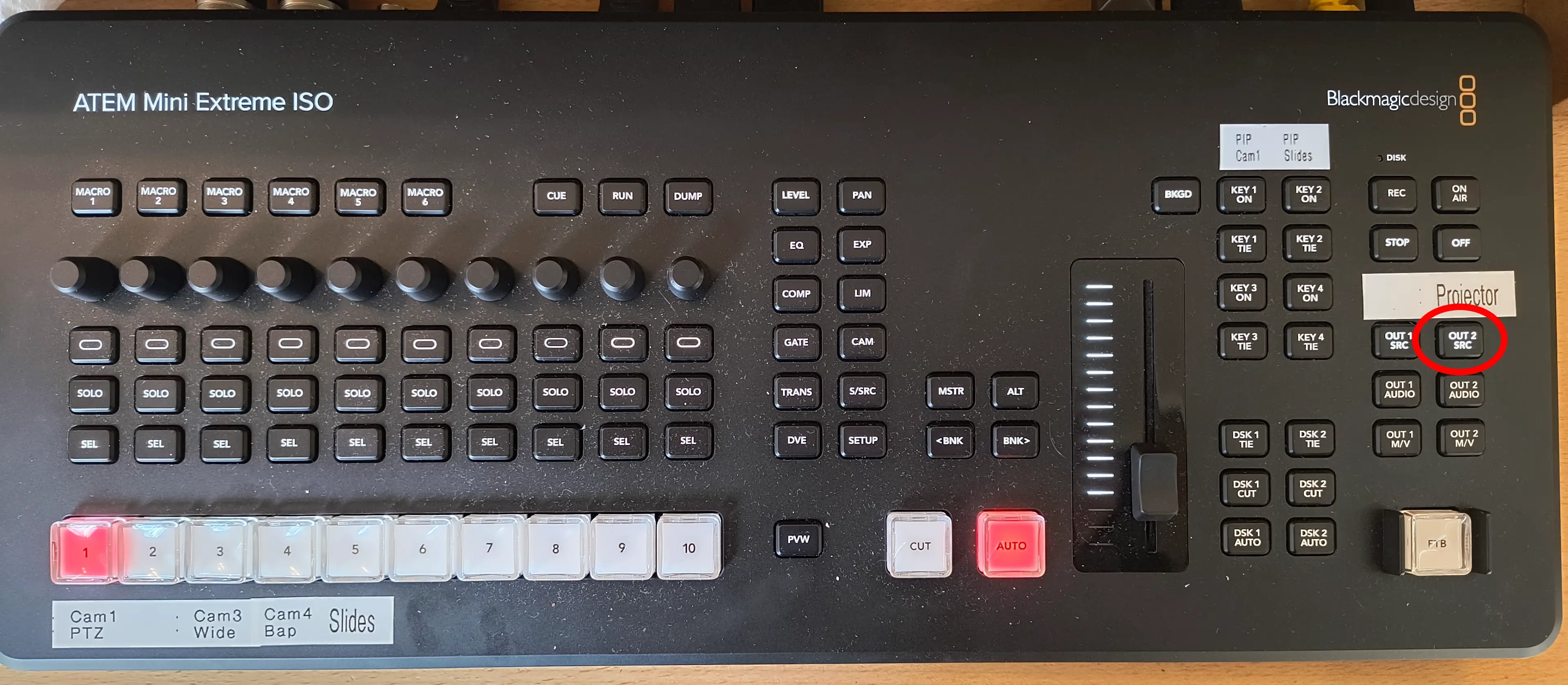 The video switcher showing the button on the right to press and hold if switching to screen